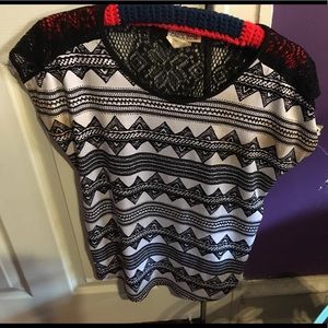 Black and white knit top with  crochet back